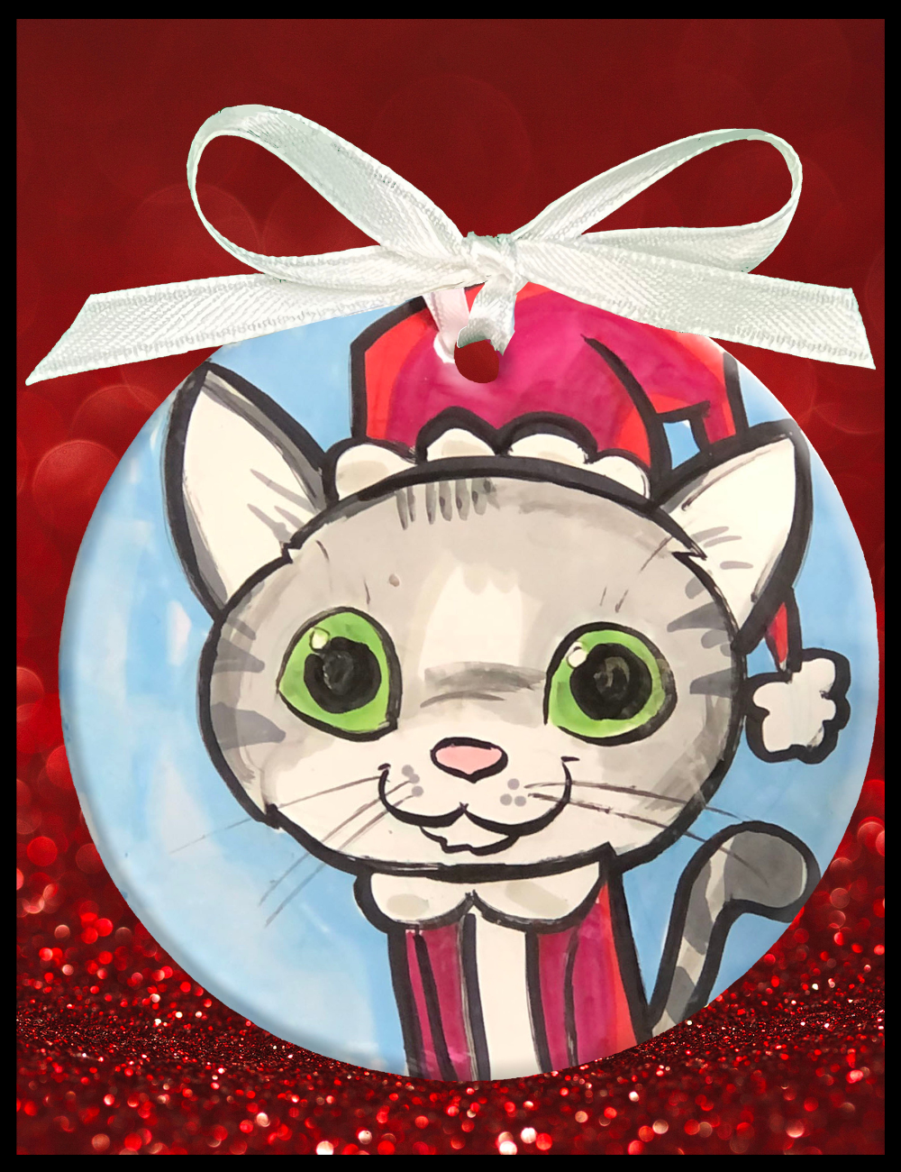 Decorative ornament with a cartoon cat design on a red background